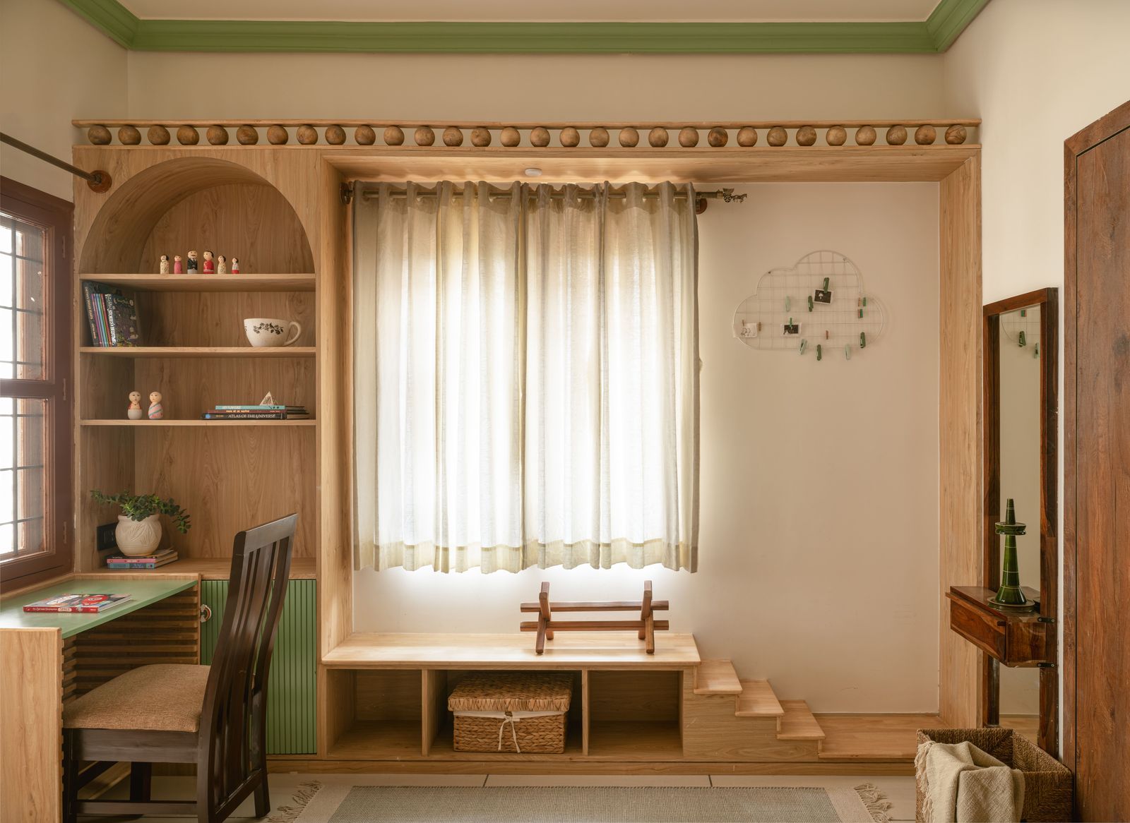 Study with arched bookshelf, window seat and beaded timber cornice